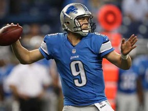 Lions QB Matthew Stafford drops back to pass during the first quarter of their pre-season game against the New York Jets at Ford Field on August 9, 2013 in Detroit, Michigan.  (Photo by Leon Halip/Getty Images)