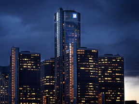 The well-lit rooms of the Marriot Hotel flank the tower of General Motors head office in the Renaissance Center in Detroit. (TYLER BROWNBRIDGE / Windsor Star files)