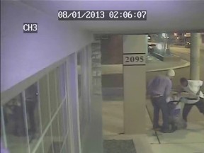An image from a security camera recording of a beating and robbery at Wyandotte Street West and Rankin Avenue. The crime took place around 2 a.m. Aug. 1, 2013. (Handout / The Windsor Star)