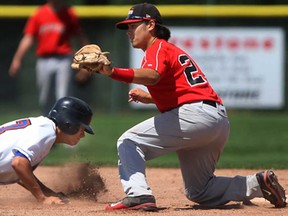 Toronto's Jake Faden, left, gets picked off at second base by Windsor's Rex Romero as the Windsor Selects sewpt the Toronto Mets in a doubleheader at Cullen Field, Saturday, August 3, 2013.  (DAX MELMER/The Windsor Star)