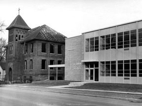 Old and new styles of school architecture stand side by side at 1124 Monmouth Rd., where the original St. Anne's School is being razed to make way for a playground. The old school has been a landmark in the Walkerville area for almost half a century and is pictured in this Dec. 17, 1959 file photo. (FILES/The Windsor Star)