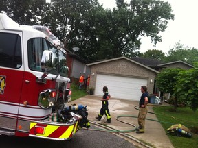 Windsor fire crews on the scene of a fire at a single-family residence in the 2400 block of St. Patrick's on Saturday, August 31, 2013. (DAX MELMER/ The Windsor Star)