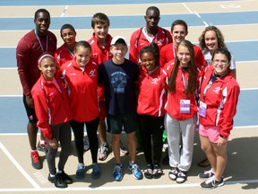 Coached by Jamie Adjetey-Nelson and Jennifer O'Brien, the Windsor-Essex athletics team finished practice Thursday, Aug. 15, 2013, and are ready to compete in the 2013 International Children's Games.  Front row, from left: Cheyann Labadie, Julie Rador, Quinn Canella, Jaien Mulder, Katie Boycott, Dana Rosaasen; back row, from left: Jamie Adjetey-Nelson, Marcus Cooper, Fletcher Smith, Rojae Rowe, Joshua Garant and Jennifer O'Brien. (JOEL BOYCE / The Windsor Star)