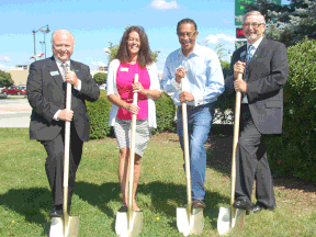 Dennis Hogan, left, chairman of the United Communities Credit Union board of directors, Amherstburg branch manager Cathy Thomas, Mayor Wayne Hurst and UCCU president and CEO Jim Lynn break ground Wednesday for the new $2-million branch that will replace the current building on Sandwich Street South. (Julie Kotsis/The Windsor Star)