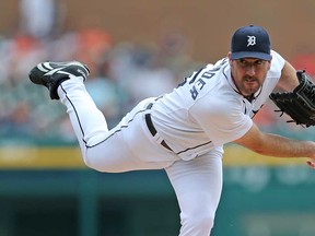 Detroit's  Justin Verlander delivers a pitche in the first inning of game one of a double header against the Kansas City Royals at Comerica Park on August 16, 2013 in Detroit, Michigan.  (Photo by Leon Halip/Getty Images
