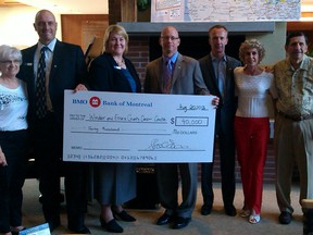 The Windsor & Essex County Cancer Centre Foundation received a $40,000 donation from BMO Financial Group on Tuesday, Aug. 20. The funds will help establish a regional men's health and cancer treatment centre in Windsor. Margaret Williams, Remo DiPaolo, Sheri Griffiths, Bill Speed, David Blyth (left to right) present WECCCF president Norma Brockenshire (second from right) and WECCCF secretary Robert Copland (far right) with the cheque. (Photo: The Windsor Star)
