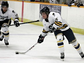 Lancers forward Evan Stibbard takes a shot during an exhibition game against the U.O.I.T. Ridgebacks Saturday, Sept. 14, 2013 at South Windsor Arena. The Lancerswon 7-4. (JOEL BOYCE/The Windsor Star)