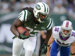Running back Chris Ivory #33 of the New York Jets carries the ball in the 1st half of the Jets game against the Buffalo Bills at MetLife Stadium on September 22, 2013 in East Rutherford, New Jersey. (Photo by Ron Antonelli/Getty Images)