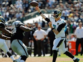 Quarterback Chad Henne #7 of the Jacksonville Jaguars passes against the Oakland Raiders in the second quarter on September 15, 2013 at O.co Coliseum in Oakland, California.  (Photo by Brian Bahr/Getty Images)