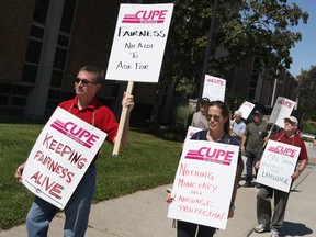 University workers with CUPE Local 1393 picket at the University of Windsor after going on strike early Sunday morning, Sept, 8, 2013.  (DAX MELMER/The Windsor Star)