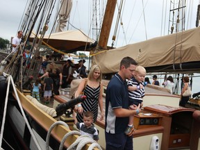 Families take tours of the Tall Ships at the Coastal Trails Sails to See at the King's Navy Yark Park in Amherstburg, Sunday, Sept. 1, 2013.  (DAX MELMER/The Windsor Star)