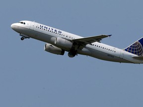 A United Airlines jet takes off from Pittsburgh International Airport in Imperial, Pa. United Airlines had to shut down its website Thursday after posting fares of as little as $5.  (AP Photo/files)