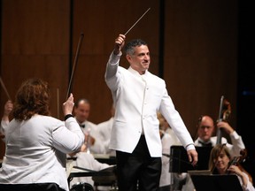 Conductor Robert Franz performs during the opening night of the WSO in the Capitol Theatre in Windsor on Friday, September 27, 2013.                (TYLER BROWNBRIDGE/The Windsor Star)