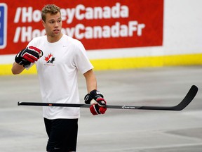 Ex-Spit Taylor Hall takes a break during a ball hockey training session at the Canadian national men's team orientation camp in Calgary. (THE CANADIAN PRESS/Jeff McIntosh)