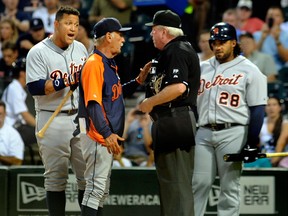 Detroit's Miguel Cabrera, left, and manager Jim Leyland, centre, argue with umpire Brian Gorman during the first inning against the White Sox in Chicago. (AP Photo/Matt Marton)