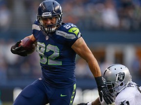 LaSalle's Luke Willson, left, is covered by Oakland's Tracy Porter during pre-season NFL action at CenturyLink Field in Seattle. (Photo by Otto Greule Jr/Getty Images)