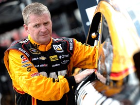 Jeff Burton, driver of the #31 Caterpillar Chevrolet, prepares his equipment in the garage area during practice for the NASCAR Sprint Cup Series IRWIN Tools Night Race at Bristol Motor Speedway on August 23, 2013 in Bristol, Tennessee.  (Jared C. Tilton/Getty Images)