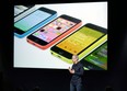 Tim Cook, CEO of Apple, speaks on stage during the introduction of the new iPhone 5c in Cupertino, Calif., Tuesday, Sept. 10, 2013. (AP Photo/Marcio Jose Sanchez)