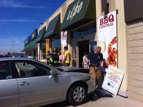 Shoppers patronizing an LCBO outlet at the intersection of Walker Road and Ottawa Street were lucky to escape injury Friday afternoon when a car smashed into the front of the store. (TwitPic: Dan Janisse/The Windsor Star)