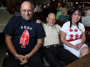 In this file photo, Devil's Brigade veteran Ralph Mayville, centre, is photographed with Mike Timoshyk, left, and Cathy Moczko at the Royal Canadian Legion in Windsor on Thursday, September 5, 2013. The trio are organizing the 67th reunion of the Devil's Brigade which will take place in Windsor the last weekend of September.           (TYLER BROWNBRIDGE/The Windsor Star)