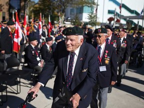 Members of the First Special Service Force, also known as the Devil's Brigade, take their seats before the start of a ceremony for the 67th Annual Reunion of the First Special Service Force Association at City Hall Square, Saturday, Sept. 28, 2013.  (DAX MELMER/The Windsor Star)
