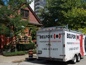A trailer from Belfor Property Restoration is parked outside a home in the 500 block of Pitt Street West, that was involved in an early morning fire, Monday, Sept. 2, 2013.  (DAX MELMER/The Windsor Star)