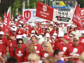Hundreds of people participate in the annual Labour Day parade on Walker Road, Monday, Sept. 2, 2013.  (DAX MELMER/The Windsor Star)