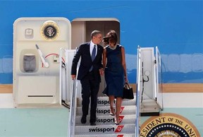 In this file photo, President Barack Obama, accompanied by first lady Michelle Obama, arrives at JFK International Airport in New York, Monday Sept. 23, 2013. (Windsor Star files)