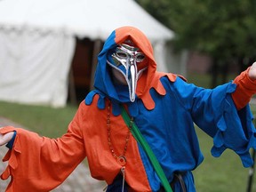 In this file photo, a jester poses at the medieval exhibition at the Olde Town Sandwich festival. (Windsor Star files)