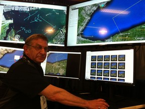 Carl Krasnor at the controls of Accipiter Radar's marine surveillance system that can track boat traffic. Krasnor was at a trade expo connected to this week's U.S./Canada Border Conference at the RenCen. (Doug Schmidt/The Windsor Star)