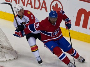 In this file photo,  Montreal Canadiens defenseman P.K. Subban (76) eludes a forechecking Florida Panthers centre Stephen Weiss (9) during the second period. (Tim Snow / THE GAZETTE)