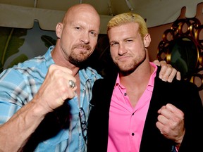 Actor/former pro wrestler Steve Austin (L) and WWE wrestler Dolph Ziggler attend WWE & E! Entertainment's "SuperStars For Hope" at the Beverly Hills Hotel on August 15, 2013 in Beverly Hills, California. (Photo by Frazer Harrison/Getty Images for WWE)