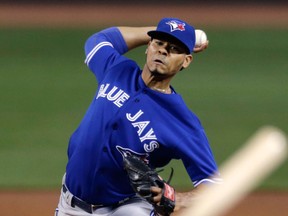 Toronto's Esmil Rogers delivers a pitch against the Boston Red Sox Friday at Fenway Park. (AP Photo/Charles Krupa)