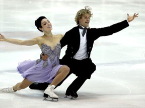 Charlie White, right, and Meryl Davis compete in the short dance program during the US International Figure Skating Classic at the Salt Lake City Sports Complex in Salt Lake City, Utah.  (Photo by Matthew Stockman/Getty Images)