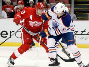 Detroit's Pavel Datsyuk, left, checks Edmonton's Ryan Nugent-Hopkins at Joe Louis Arena. (THE CANADIAN PRESS/AP/Duane Burleson)