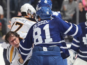 Toronto's Phil Kessel, right, fights Buffalo's Brian Flynn at the Air Canada Centre. (Photo by Claus Andersen/Getty Images)