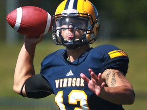 Windsor quarterback, Austin Kennedy throws the ball against the Carleton Ravens. (DAX MELMER/The Windsor Star)