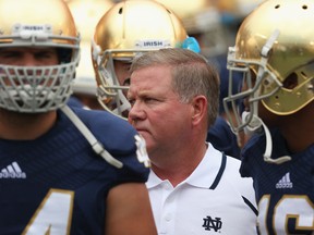 Notre Dame coach Brian Kelly waits to run onto the field with his team before their opening game against the Temple Owls at Notre Dame Stadium in South Bend, Indiana. (Photo by Jonathan Daniel/Getty Images)