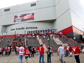 Hockey fans enter Joe Louis Arena for a game in 2009. (AP Photo/Carlos Osorio, File)