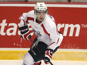 Spits forward Chris Marchese carries the puck during training camp at the WFCU Centre. (DAN JANISSE/The Windsor Star)