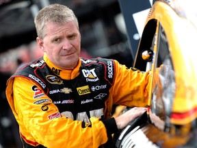 Jeff Burton, driver of the #31 Caterpillar Chevrolet, prepares his equipment in the garage area during practice for the NASCAR Sprint Cup Series IRWIN Tools Night Race at Bristol Motor Speedway in Bristol, Tennessee.  (Photo by Jared C. Tilton/Getty Images)
