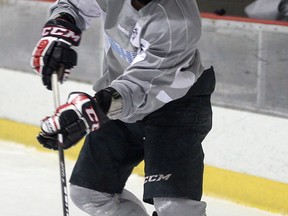 Spitfires forward Remy Giftopoulos shoots the puck during practice at the WFCU Centre. (NICK BRANCACCIO/The Windsor Star)