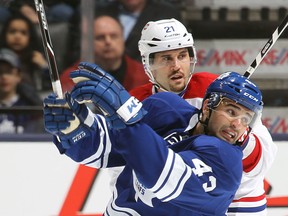 Toronto's Nazem Kadri, front, is checked by Montreal's Tomas Pleckanec at the Air Canada Centre. (Photo by Claus Andersen/Getty Images)