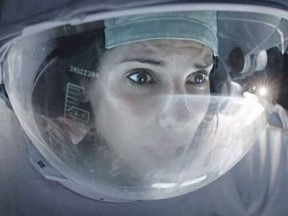 Sandra Bullock stars in the Sci-Fi thriller Gravity. (Courtesy of Warner Bros., Pictures)