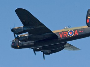 A Lancaster bomber flies past as the Battle of Britain Ceremony took place September 20, 2009, at the Canada Aviation Museum in Ottawa. (Postmedia News files)