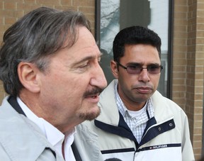 OCTOBER 26, 2012 -- Kuldeep Singh Dharni, right, accused of smuggling 100 kilos of cocaine worth an estimated street value of $10 million, was acquitted of all charges today. At left is his lawyer Patrick Ducharme outsiide the Superior Court of Justice in Windsor, Ontario.  (JASON KRYK/ The Windsor Star)