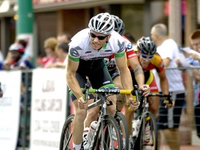 Tour di Via Italia cyclists pushed through the 100km, 55-lap course along the streets of Windsor’s Little Italy Sunday, Sept. 1, 2013. Jeff Schiller from St. Thomas, Ont. won first place, followed by Peter Morse from Marham, Ont. and Steve McKee from Hamilton. (JOEL BOYCE/Windsor Star)