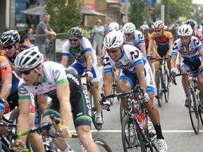 Tour di Via Italia cyclists pushed through the 100-km, 55-lap course along Erie Street Sunday, Sept. 1, 2013. Jeff Schiller from St. Thomas, Ont. won first place, followed by Peter Morse from Marham, Ont. and Steve McKee from Hamilton. (JOEL BOYCE/Windsor Star)