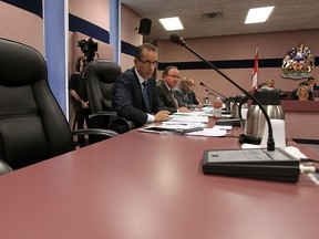 Percy Hatfield's empty seat is seen during a city council meeting at city hall in Windsor on Monday, September 9, 2013.        (TYLER BROWNBRIDGE/The Windsor Star)