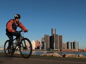 A cyclist pedals his way along Windsor's riverfront on a clear crisp Monday morning, September 23, 2013.  (DAX MELMER/The Windsor Star)